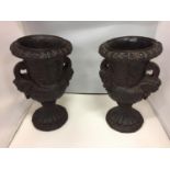 TWO DECORATIVE TWIN HANDLED RESINS URNS