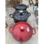 TWO CROFTON COOKING POTS AND A FURTHER COOKING POT