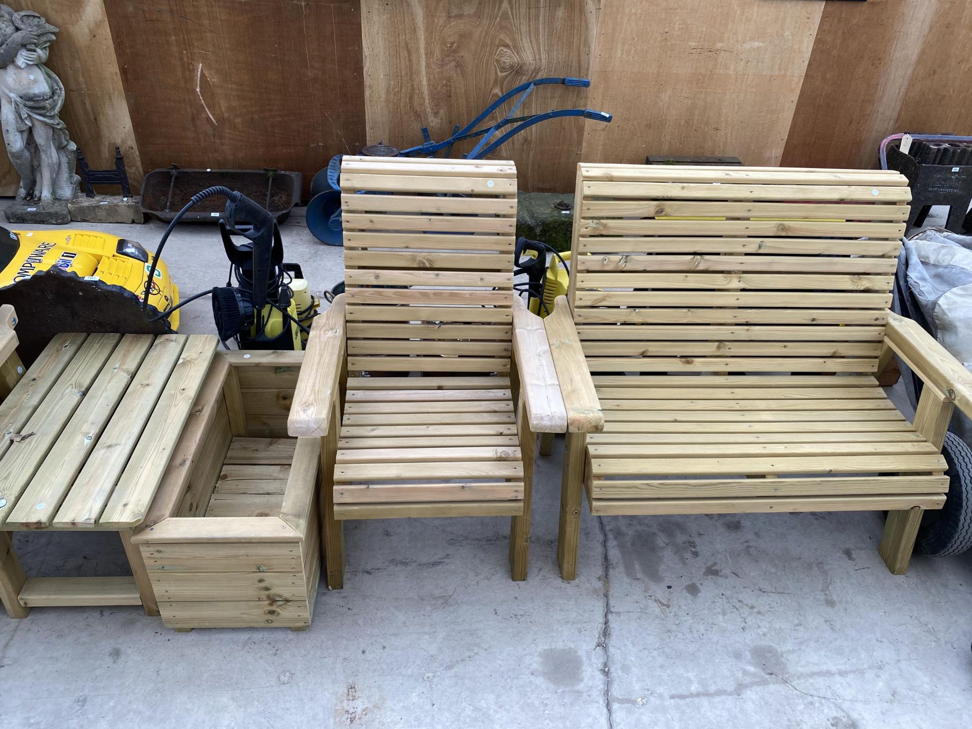 A WOODEN GARDEN FURNITURE SET TO INCLUDE A TWO SEATER BENCH, A CHAIR, A PLANTER AND A SIDE TABLE