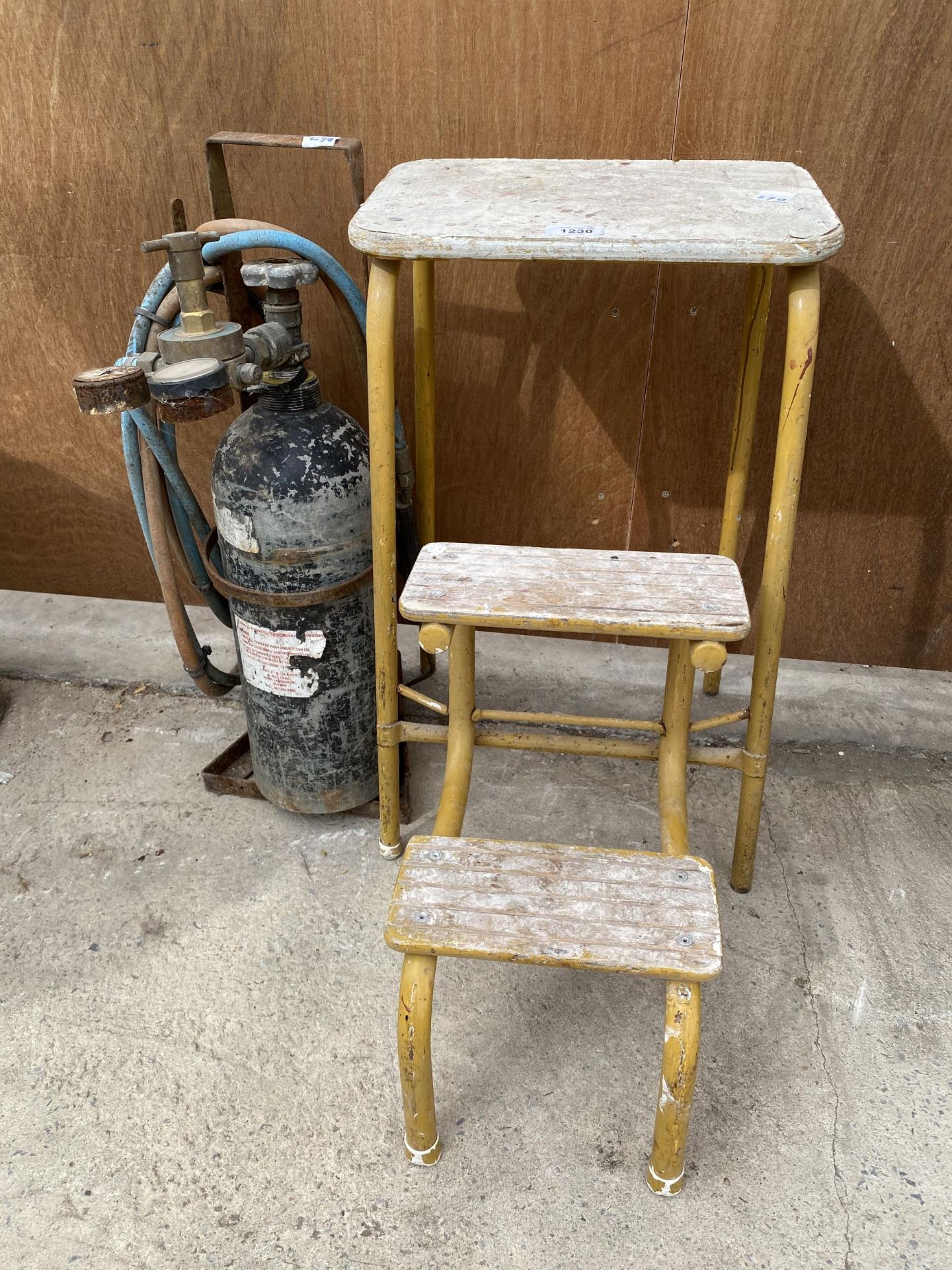 A VINTAGE KITCHEN STEP AND A GAS CUTTING BOTTLE