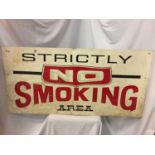 A LARGE METAL NO SMOKING SIGN