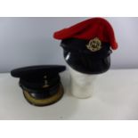 A BRITISH ROYAL MILITARY POLICE PEAKED CAP AND A ROYAL CORP OF SIGNALS PEAKED CAP, SIZE 7 1/4