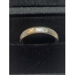 A 9 CARAT WHITE GOLD WEDDING BAND IN A PRESENTATION BOX