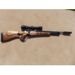 A GOOD QUALITY PRESTIGE KUR .22 CALIBRE AIR RIFLE, 63CM BARREL WITH SILENCER, BUSHELL TELESCOPIC