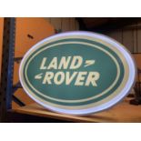 A LARGE LAND ROVER DOUBLE SIDED ILLUMINATED SIGN