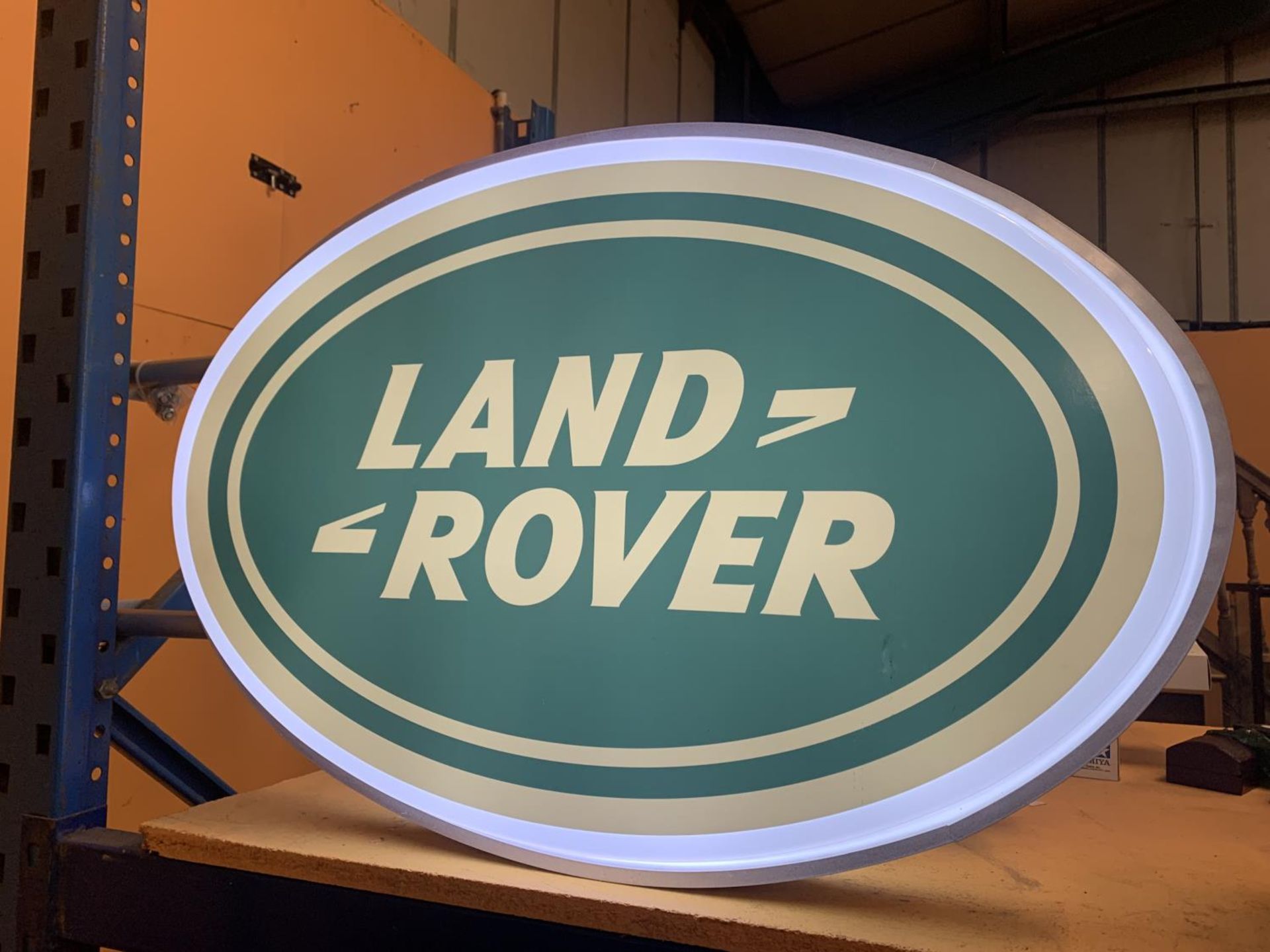 A LARGE LAND ROVER DOUBLE SIDED ILLUMINATED SIGN