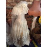 A SATIN WEDDING DRESS WITH VEIL, HEADRESS, BOXED HOOP UNDERSKIRT AND POSY