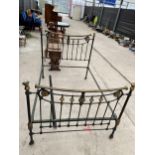 A VICTORIAN 4'6" BRASS AND IRON BEDSTEAD