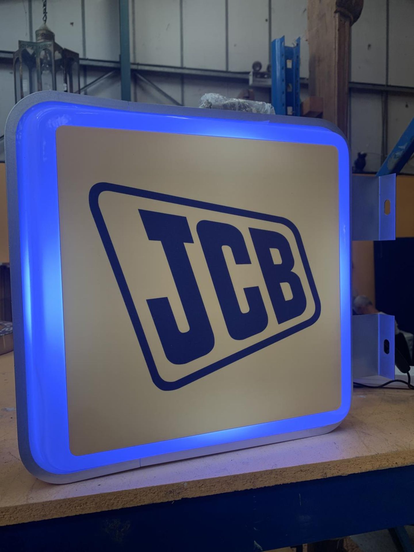 A JCB DOUBLE SIDED ILLUMINATED SIGN