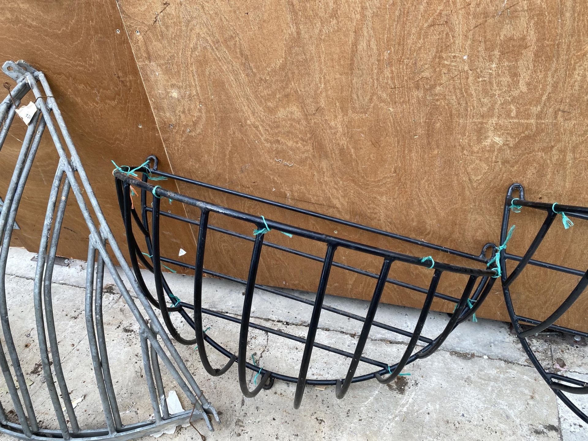 A PAIR OF WROUGHT IRON WALL HANGING HAY RACKS - Image 3 of 4