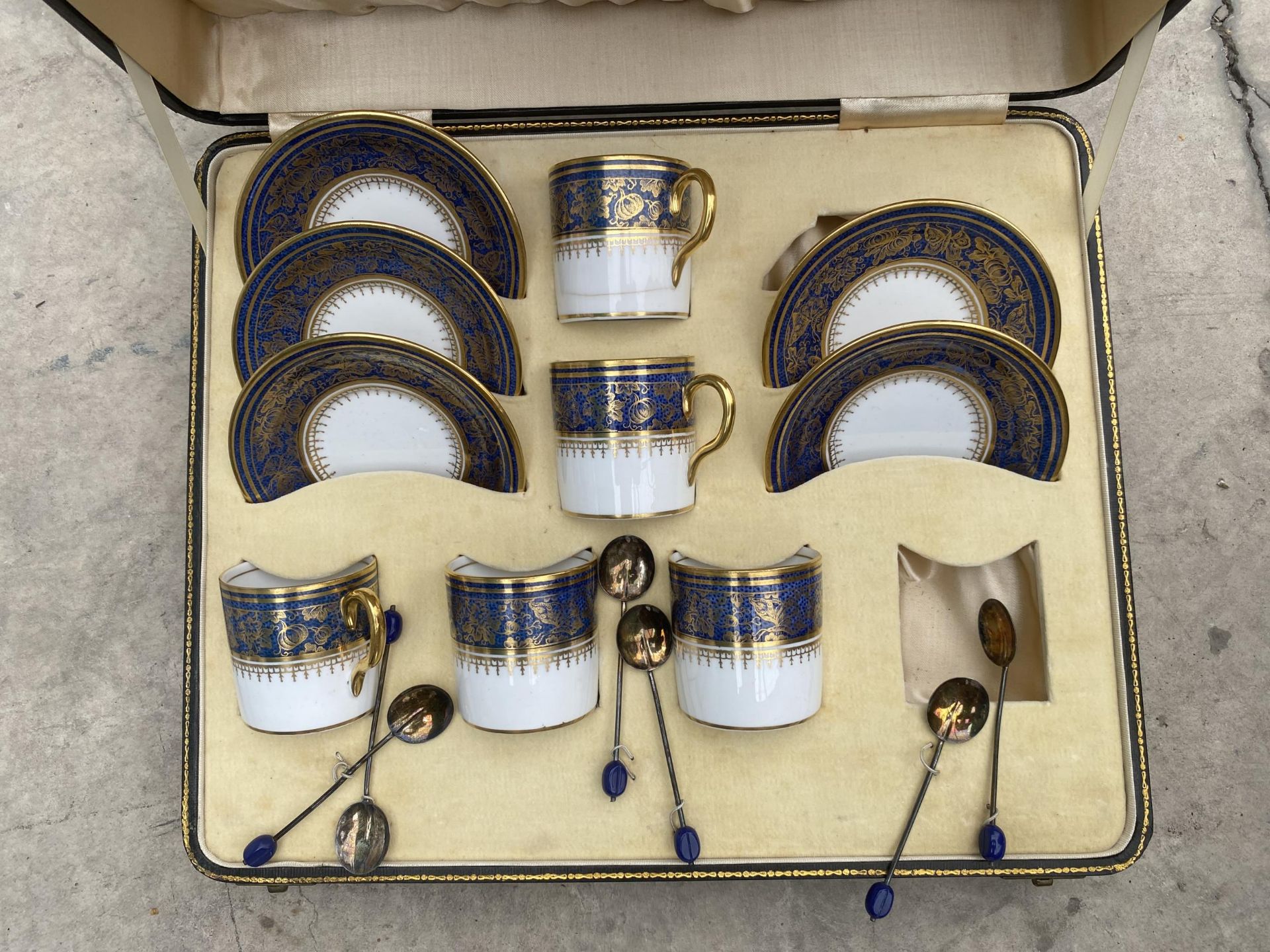 A CASED SIX PIECE COFFEE SET WITH SIX HALLMARKED SILVER COFFEE BEAN SPOONS (ONE CUP AND SAUCER - Image 2 of 2