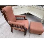 A VICTORIAN MAHOGANY FIRESIDE CHAIR WITH TURNED UPRIGHTS AND FRONT LEGS WITH LATER STOOL HAVING