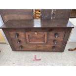 A MAINLY 19TH CENTURY MAHOGANY CHEST OF FOUR SHORT AND ONE LONG DRAWER AND A CENTRAL TOP HAT