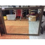 A MODERN GILT AND BLACK STRIPE PATTERNED FRAMED MIRROR SIZE 65CM X50CM