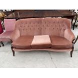 A PARKER KNOLL STYLE STYLE THREE SEATER SETTEE