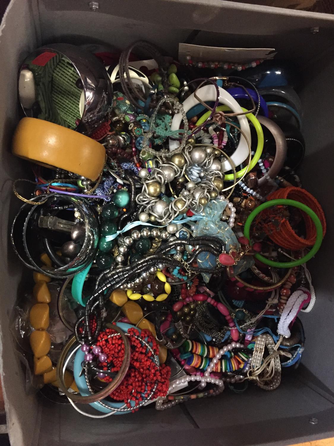 A LARGE BOX OF COSTUME JEWELLERY