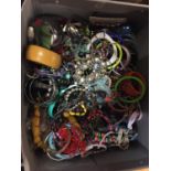 A LARGE BOX OF COSTUME JEWELLERY