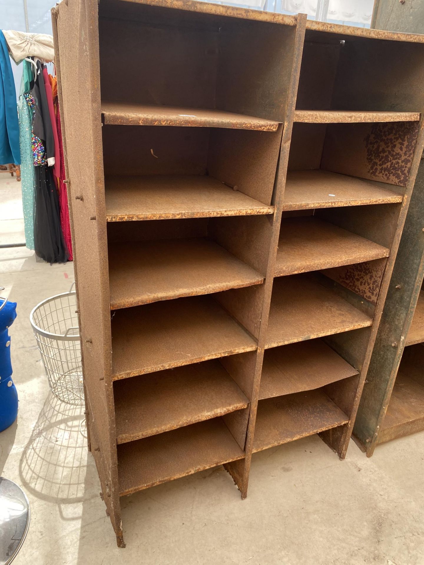 A VINTAGE METAL SIX TIER WORKSHOP SHELVING UNIT