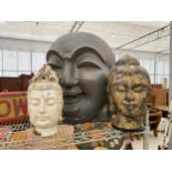 A GROUP OF THREE VARIOUS RESIN BUDDAH AND FIGURE HEADS