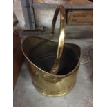 A BRASS COAL SCUTTLE