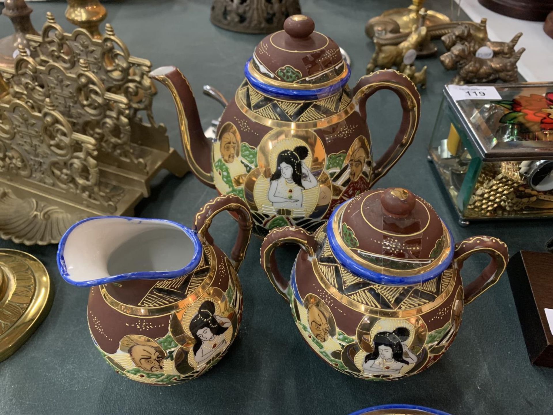 AN ORIENTAL SATSUMA TEA SET TO INCLUDE A TEAPOT, JUG, SUGAR BOWL AND FOUR CUPS AND SAUCERS - Image 2 of 3