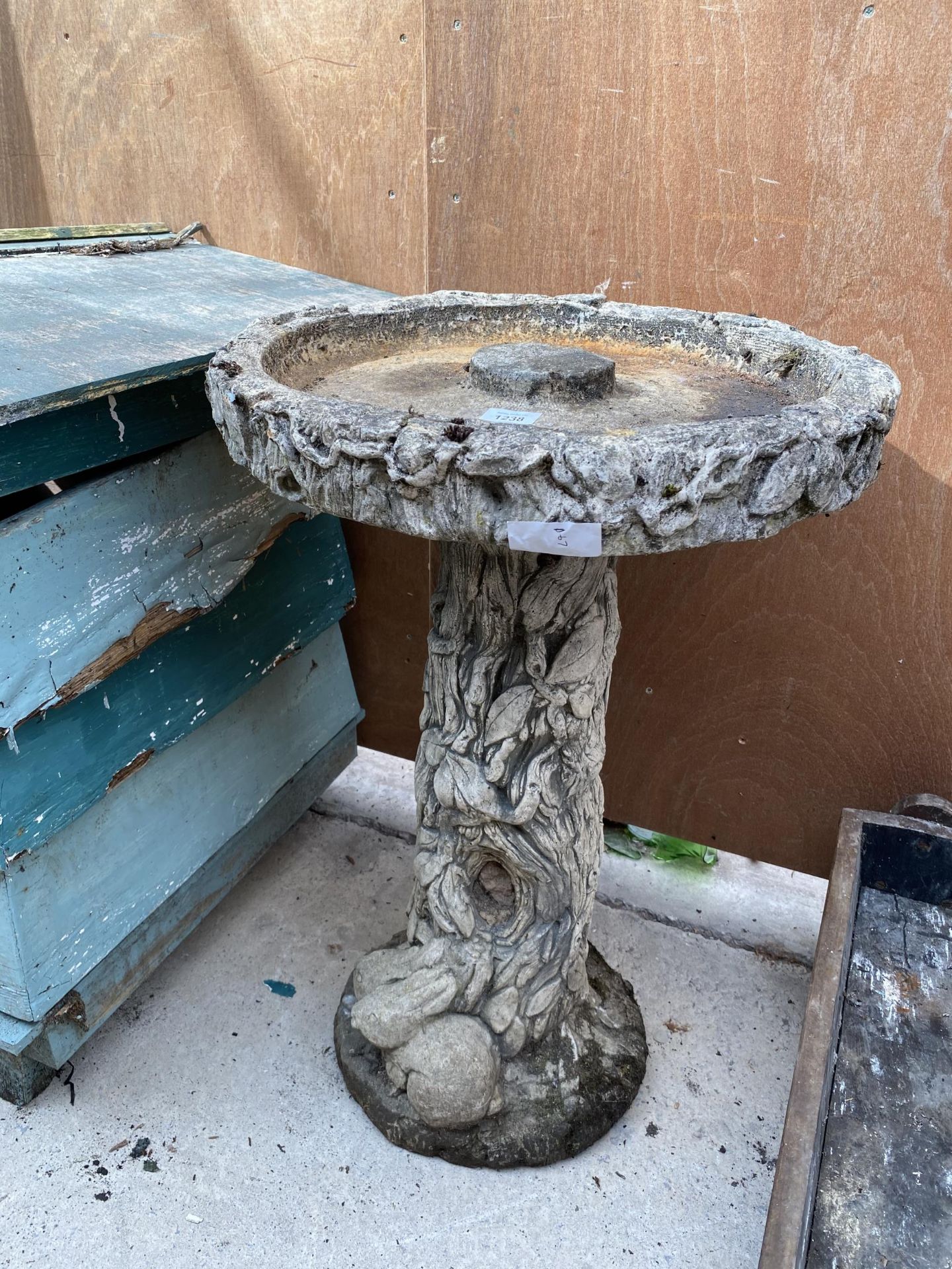 A VINTAGE STONE EFFECT BIRD BATH WITH PEDESTAL BASE