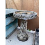 A VINTAGE STONE EFFECT BIRD BATH WITH PEDESTAL BASE