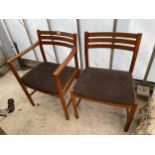 A RETRO TEAK ELBOW CHAIR AND MATCHING DINING CHAIR