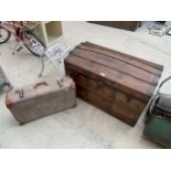A VINTAGE WOODEN STORAGE CHEST WITH DECORATIVE WOODEN BANDING AND METAL STUD WORK AND A FURTHER