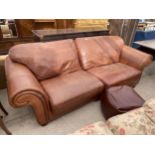 A MODERN LEATHER KLAUSSNER LTD SOFA AND A HOME STORE POUFFE