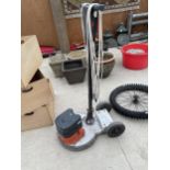 AN ELECTRIC FLOOR POLISHER