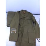 A MID 20TH CENTURY ROYAL ARMY VETERINARY CORP MAJORS UNIFORM, COMPRISING OF A JACKET AND TROUSERS