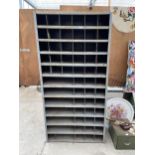 A VINTAGE METAL 60 SECTION PIGEON HOLE STORAGE UNIT