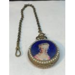 AN ENAMEL AND PEARL DOUBLE SIDED POCKET WATCH