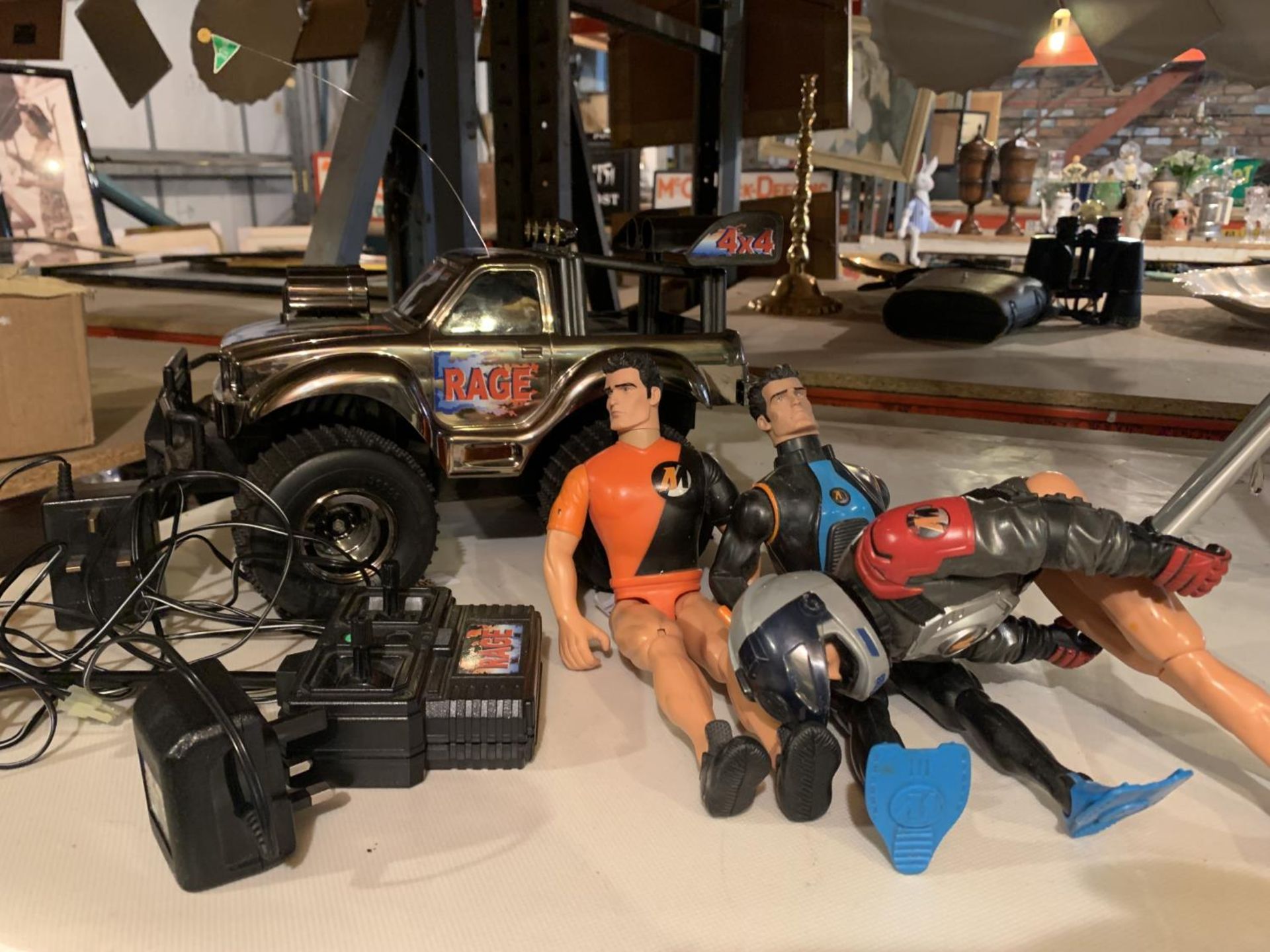 THREE ACTION MAN FIGURES AND TRUCK RADIO CONTROLLED