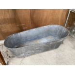 A VINTAGE GALVANISED TIN BATH