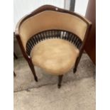 AN EDWARDIAN MAHOGANY AND INLAID TUB CHAIR ON TAPERED LEGS, WITH SPADE FEET