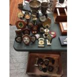 A SUITCASE OF VARIOUS SPORTING TROPHIES