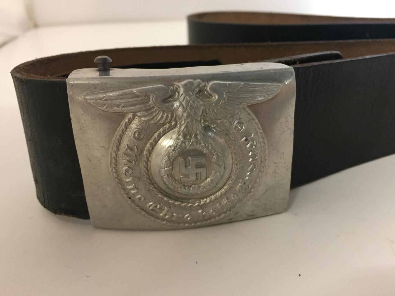 A GERMAN LEATHER BELT THE METAL BUCKLE WITH EAGLE AND SWASTIKA - Image 2 of 3