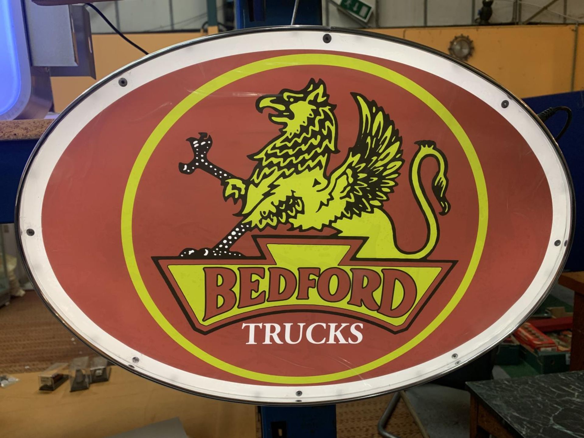 A BEDFORD TRUCKS ILLUMINATED SIGN