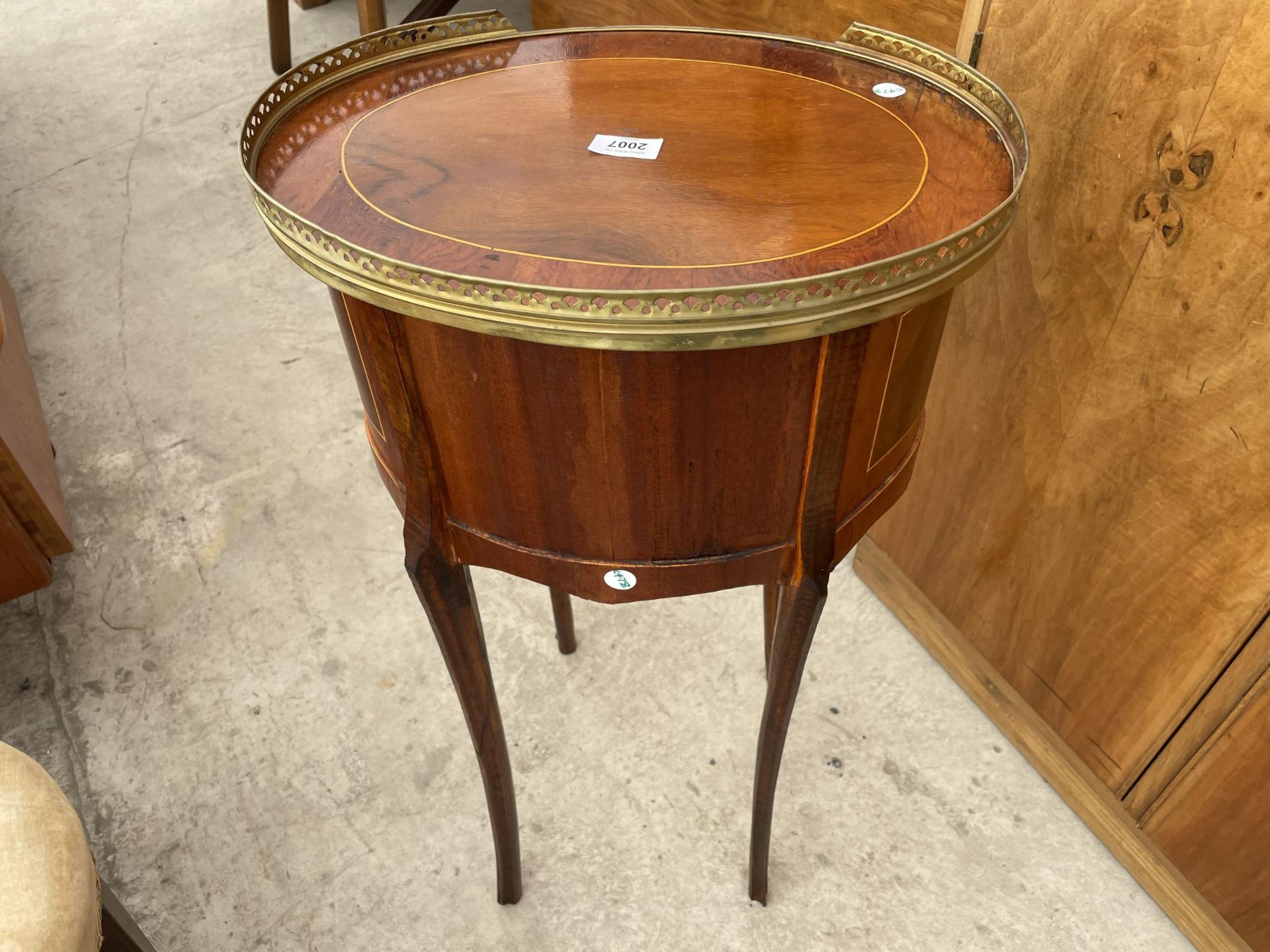 AN OVAL LOUIS XVI STYLE WALNUT SIDE TABLE WITH THREE SMALL DRAWERS, BRASS PIERCED GALLERY AND - Image 6 of 6