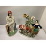 TWO STAFFORDSHIRE FLATBACKS TO INCLUDE A CRICKETER AND A LADY WITH COW