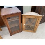 A PINE ASTRAGAL GLAZED CORNER CUPBOARD AND AN OAK STEREO CABINET