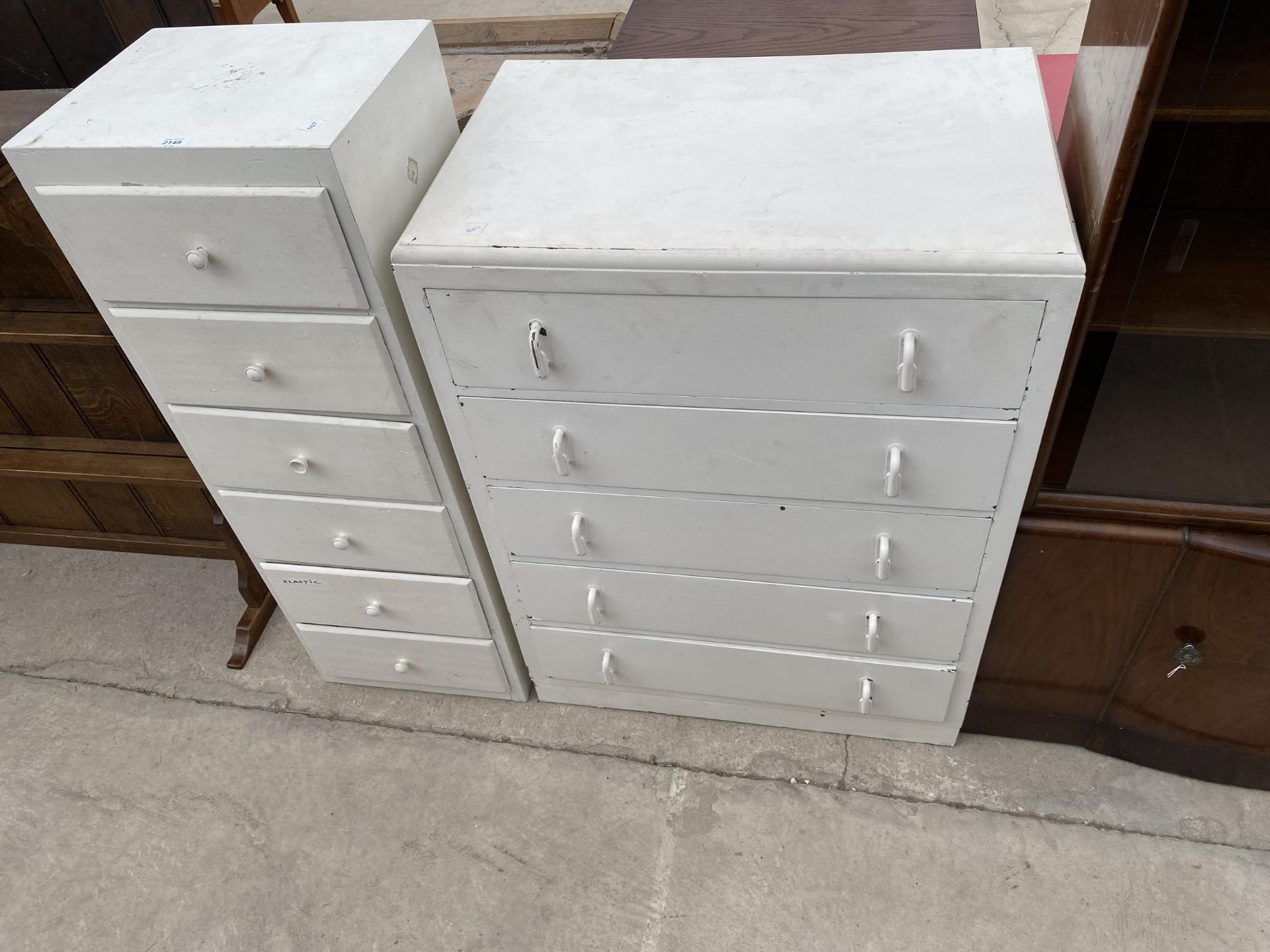A PAINTED CHEST OF FIVE DRAWERS 29" WIDE AND A SMALLER CHEST 16" WIDE