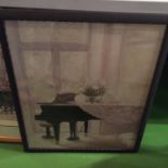 A FRAMED PRINT OF A STUDY OF A PIANO