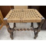 AN EARLY 20TH CENTURY OAK BARLEYTWIST STOOL