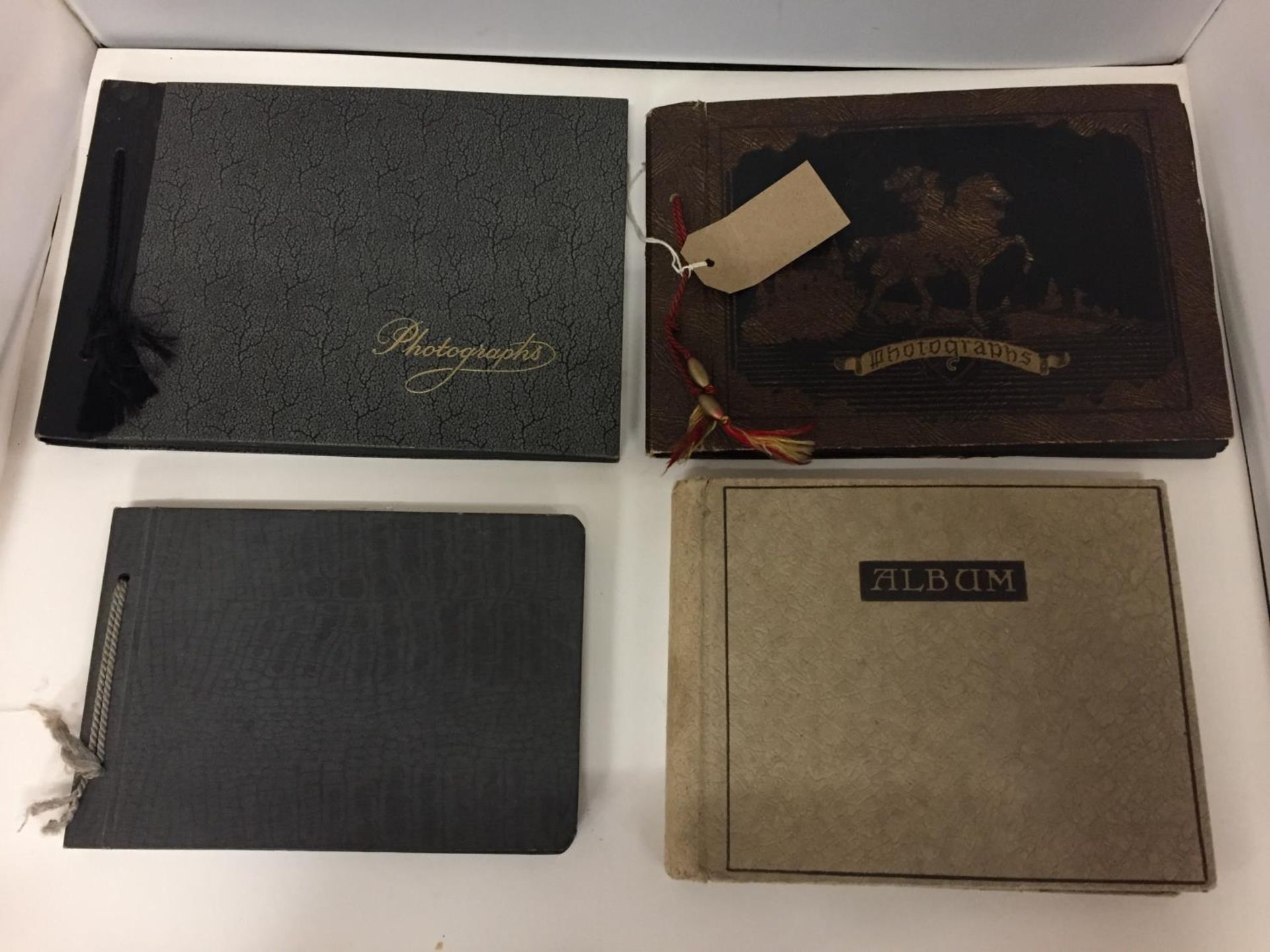 FOUR VINTAGE PHOTOGRAPH AND POSTCARD ALBUMS