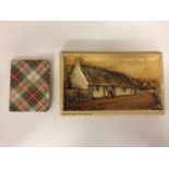 A ROBERT BURNS COTTAGE ON A CERAMIC BASE