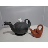 A CHINESE YIXING POTTERY SWAN TEAPOT AND A SECOND DRAGON AND KNIGHT TEAPOT