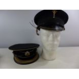 A WELSH GUARDS PEAKED CAP AND A ROYAL ARMY SERVICE CORPS CAP (2)